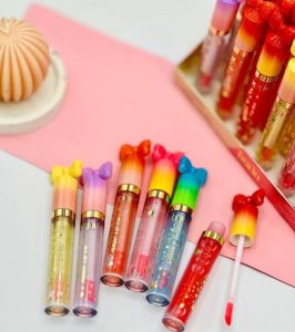 QTxCCPAVPGJWfBok 266x300 - پک 6عددی برق لب حرارتی شاین دار پاپیونی بارین (Magic Lip Oil BARIN)